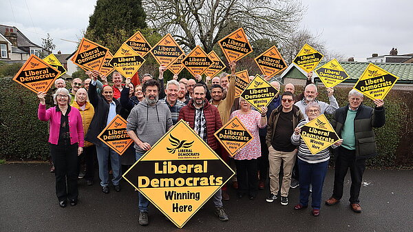 Newcastle Lib Dem team with placards