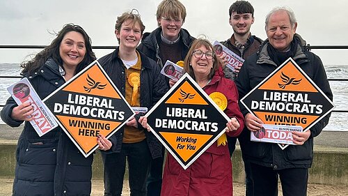 Alison Barnes and team with placards and leaflets